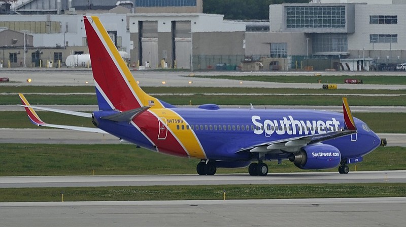 A Southwest Airlines jetliner taxis down a runway at Cleveland Hopkins International Airport, Tuesday, Oct. 12, 2021, in Cleveland. (AP Photo/Tony Dejak)


