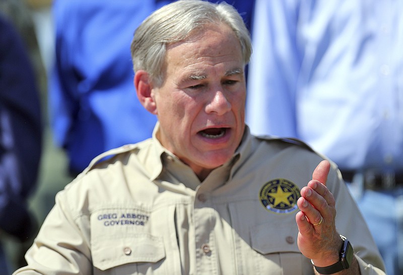 Photo by Joel Martinez/The Monitor via The Associated Press / Texas Gov. Greg Abbott , shown here at a news conference at Anzalduas Park on Oct. 6, 2021, in Mission, Texas, issued an executive order Monday to prohibit any entity, including private business, from enforcing a COVID-19 vaccine mandate on workers.