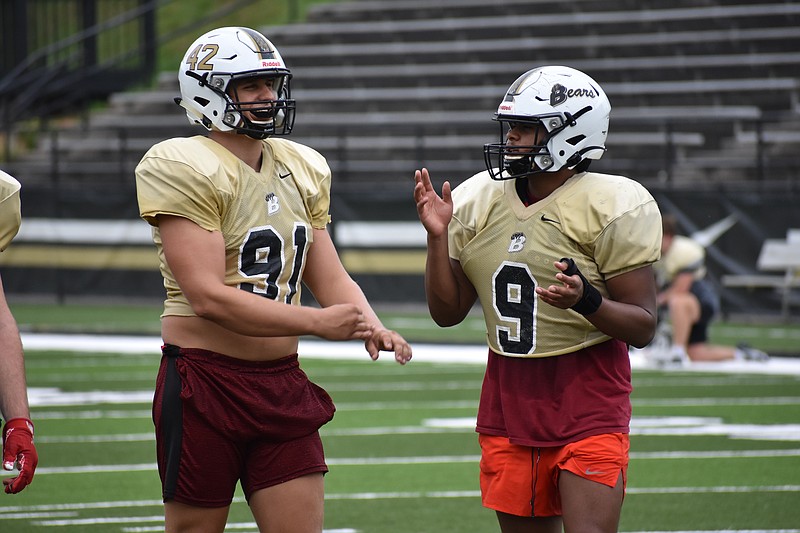 Staff photo by Patrick MacCoon / Bradley Central seniors Josh Helsdon, left, and Isaiah Arnold have been anchors on the defensive line this season for the Bears.