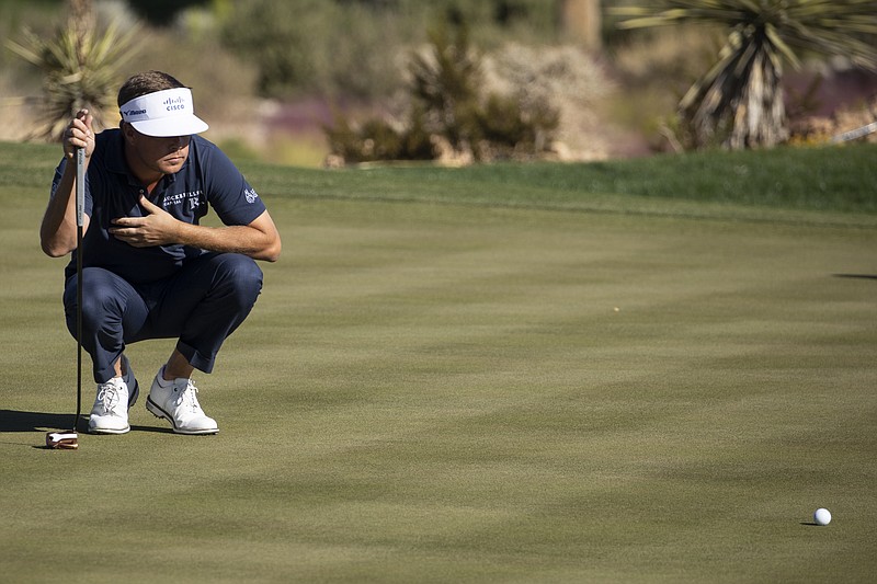 Las Vegas Review-Journal photo by Erik Verduzco via AP / Chattanooga native Keith Mitchell prepares to putt on the eighth green during the second round of the CJ Cup at Summit on Friday in Las Vegas.
