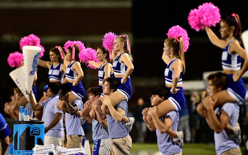 Staff photo by Robin Rudd / McCallie's cheerleaders root for the Blue Tornado during Friday night's home win against Father Ryan.