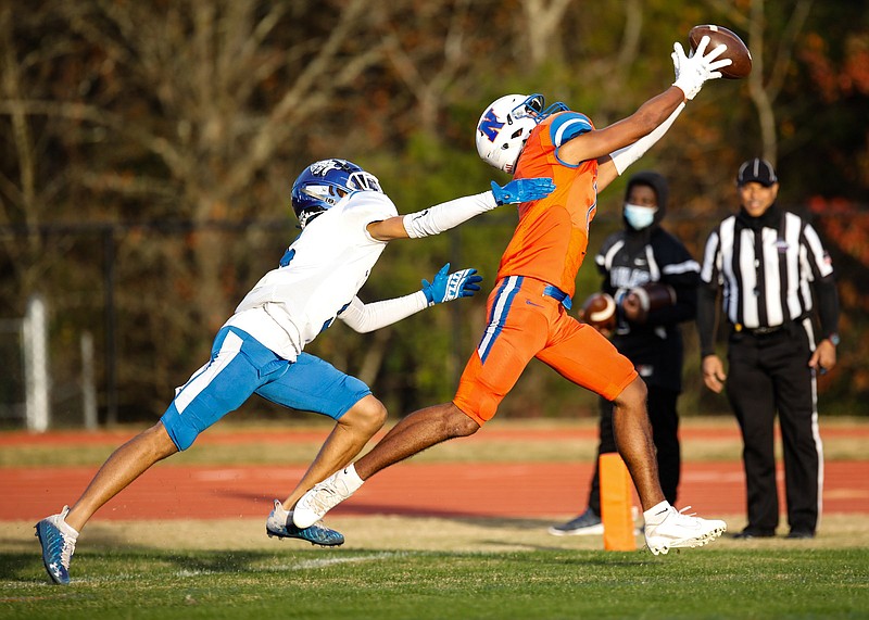 Staff file photo by Troy Stolt / Northwest Whitfield wide receiver Ray Morrison, right, helped the Bruins to a home win against Heritage in GHSA Region 7-AAAA play Friday night in Tunnel Hill, Ga.