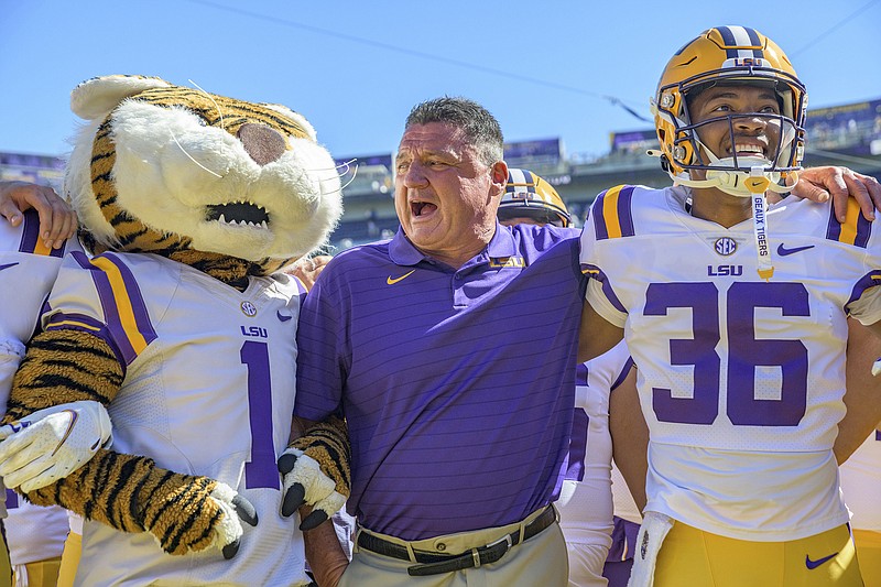 AP photo by Matthew Hinton / LSU football coach Ed Orgeron celebrates his team's 49-42 home win against Florida on Saturday. Orgeron coached the Tigers to the national championship in their undefeated 2019 season, but they're 9-8 since that 15-0 campaign and he has agreed with LSU not to return after this season.