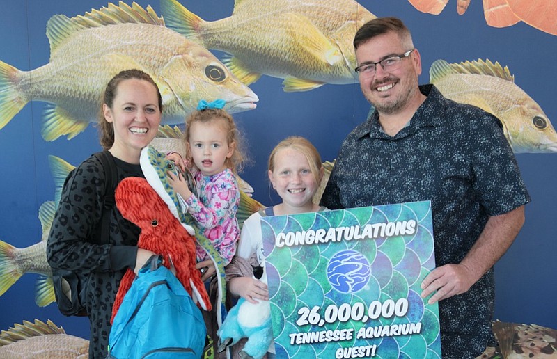 Contributed photo from The Tennessee Aquarium / The Suttle family, from Bowling Green, Kentucky, were the Tennessee Aquarium's 26-millionth guest. From left are Jilann, Zara, Aliah and Nick Suttle.
