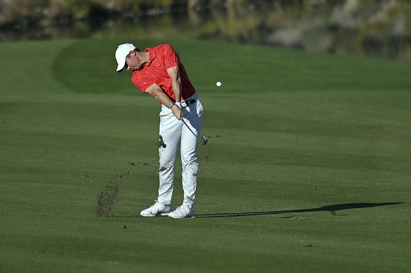 AP photo by David Becker / Rory McIlroy takes his second shot on No. 15 during the final round of the CJ Cup at Summit on Sunday in Las Vegas.