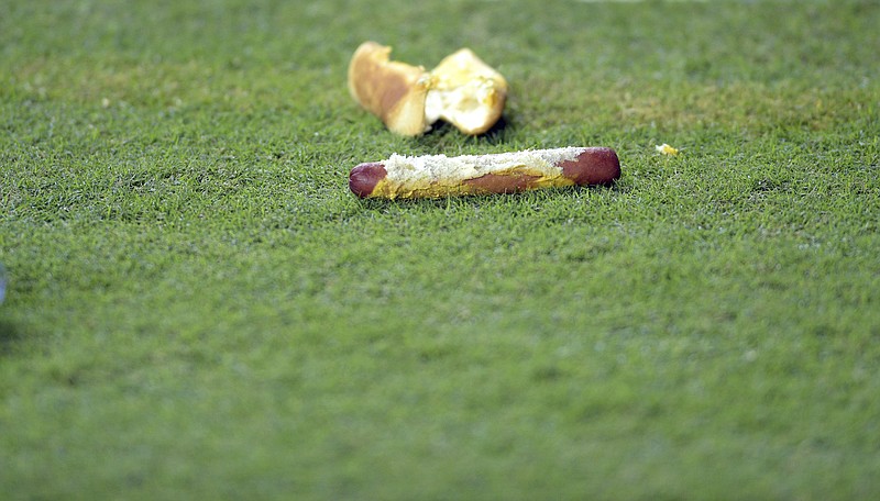 University of Tennessee fans, angry with a call near the end of a football game with Ole Miss on Saturday, threw a variety of objects onto the field Saturday, ranging from the harmless to full beer cans, golf balls and even glass bottles.