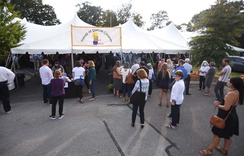 Staff Photo by Matt Hamilton / Guests check in at the fundraiser at Signal Centers.