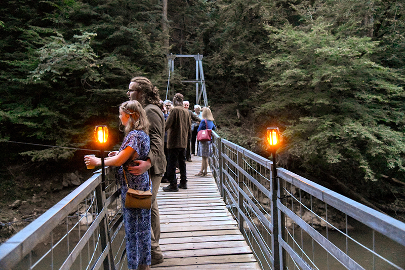 Photo by Mark Gilliland / Couples on the bridge over South Chickamauga Creek at Audubon Acres.