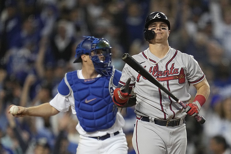 Atlanta Braves' Joc Pederson reacts after striking out in the ninth inning against the Los Angeles Dodgers in Game 3 of baseball's National League Championship Series Tuesday, Oct. 19, 2021, in Los Angeles. (AP Photo/Ashley Landis)