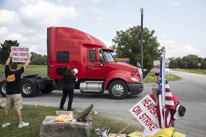 FILE - Bettye Jo Boone, a 30 year employee of Heaven Hill, pickets in front of Heaven Hill Distillery in Bardstown, Ky., Monday, Sept. 13, 2021. (Silas Walker/Lexington Herald-Leader via AP, File)


