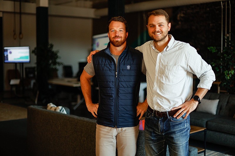 Staff photo by Troy Stolt / Brian Trautschold and Jared Houghton, co-founders of Ambition, a sales technology company that recently secured another $15.5 million of equity funding, pose for a portrait on Tuesday, Oct. 19, 2021 in Chattanooga, Tenn.