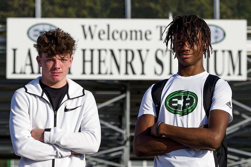 Staff file photo by C.B. Schmelter / From left, East Hamilton football players Jaxon and Jeremiah Flemmons are old friends whose bond became stronger when Jeremiah moved in with Jaxon's family and was eventually adopted.