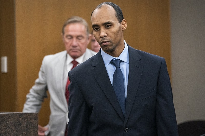 FILE - In this Friday, June 7, 2019 file photo, Former Minneapolis police officer Mohamed Noor walks to the podium to be sentenced at Hennepin County District Court in Minneapolis. Noor is a former Minneapolis police officer who fatally shot an unarmed woman after she called 911 to report a possible rape behind her home. (Leila Navidi/Star Tribune via AP, Pool, File)


