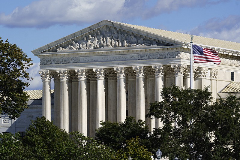 Photo by J. Scott Applewhite of The Associated Press / In this Oct. 18, 2021, photo, the Supreme Court is seen in Washington. Texas is urging the Supreme Court to leave in place its law banning most abortions and telling the justices there's no reason to rush into the case.