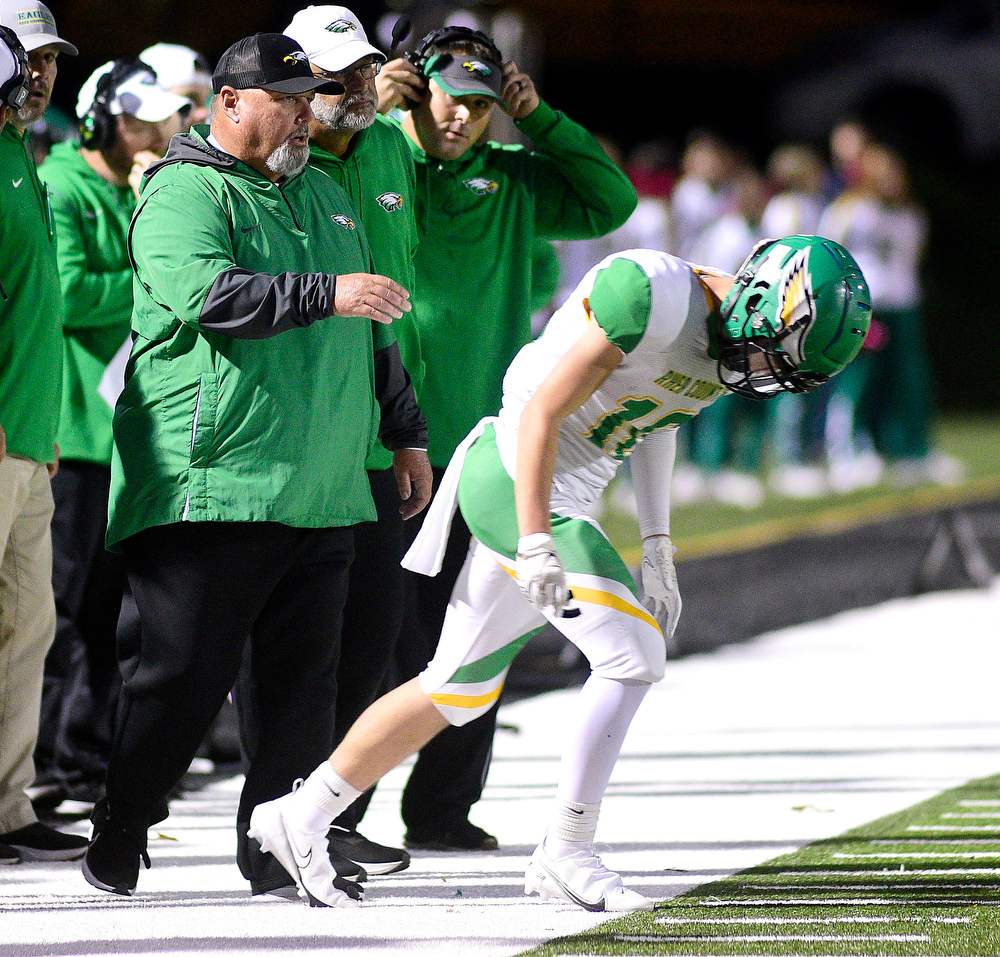 Staff Photo by Robin Rudd / Rhea County head coach Mark Pemberton sends Drew Massengill (10) in with the play. The Bradley Central Bears hosted the Rhea County Golden Eagles in a TSSAA football game on October 22, 2021.