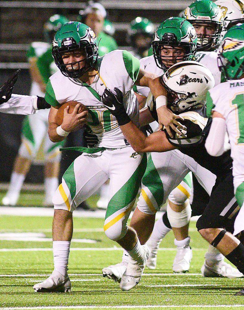 Staff Photo by Robin Rudd / Rhea's Caleb O'Dell (20) is stopped by Bradley's Knox Watson (2). The Bradley Central Bears hosted the Rhea County Golden Eagles in a TSSAA football game on October 22, 2021.