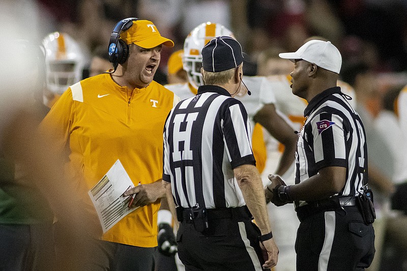 AP photo by Vasha Hunt / Tennessee football coach Josh Heupel argues with officials after a touchdown by Alabama quarterback Bryce Young during the second half of Saturday night's SEC matchup in Tuscaloosa, Ala.