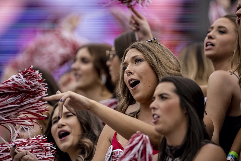 FILE - In this Saturday, Oct. 2, 2021, file photo, Alabama fans cheer during the first half of an NCAA college football game against Mississippi,, in Tuscaloosa, Ala. (AP Photo/Vasha Hunt, File)


