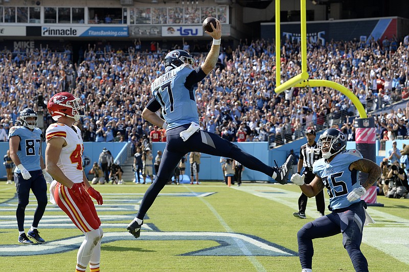 AP photo by Mark Zaleski / Tennessee Titans quarterback Ryan Tannehill (17) scores a touchdown against the Kansas City Chiefs during the first half of Sunday's game in Nashville.