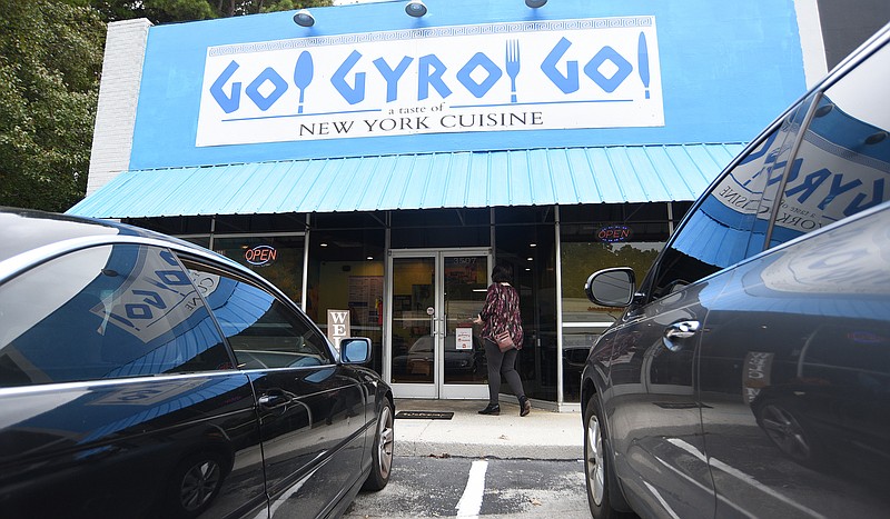 Staff Photo by Matt Hamilton / A customer enters Go Gyro Go on Tuesday, October 26, 2021 in East Ridge. Go Gyro Go recently opened in their new location in East Ridge.