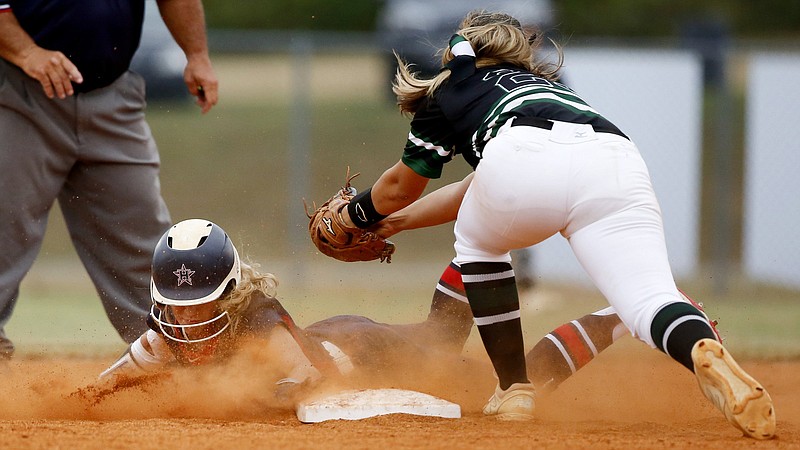 Staff photo / Heritage's Riley Kokinda steals second base during a state playoff game in October 2019 in Ringgold, Ga. Kokinda has been a leading player this season as the program tries to win the GHSA Class AAAA state title for the fourth year in a row.