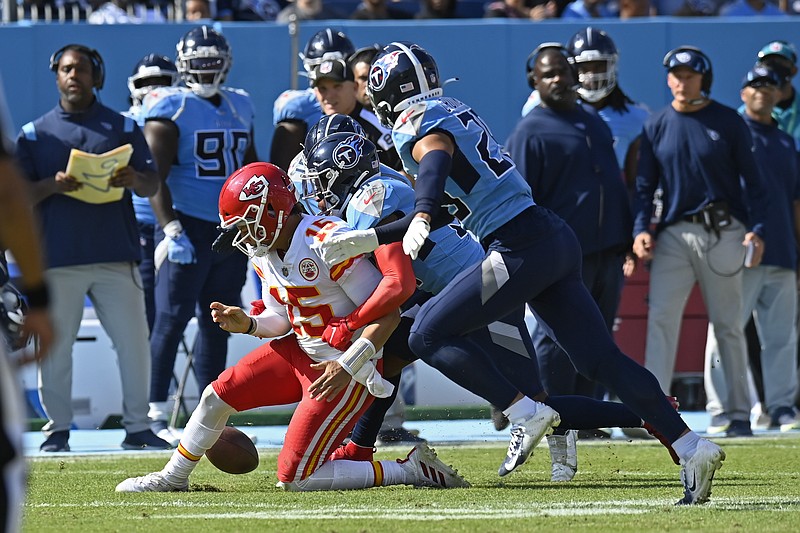 AP photo by Mark Zaleski / Kansas City Chiefs quarterback Patrick Mahomes fumbles as he is hit by Tennessee Titans safety Kevin Byard during Sunday's game in Nashville. The Titans had their best defensive performance of the season in a 27-3 victory.