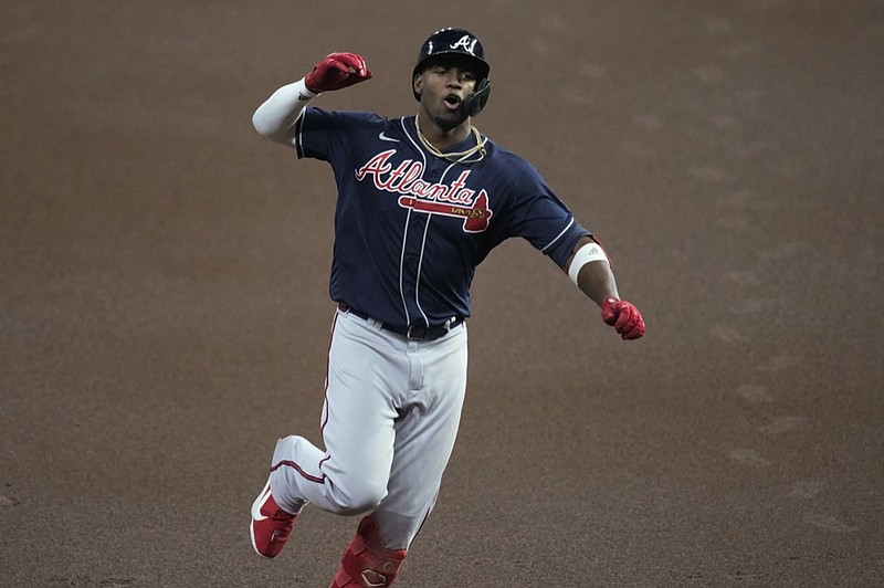 Atlanta Braves' Jorge Soler celebrates his home run during the first inning of Game 1 in baseball's World Series between the Houston Astros and the Atlanta Braves Tuesday, Oct. 26, 2021, in Houston. (AP Photo/Eric Gay)


