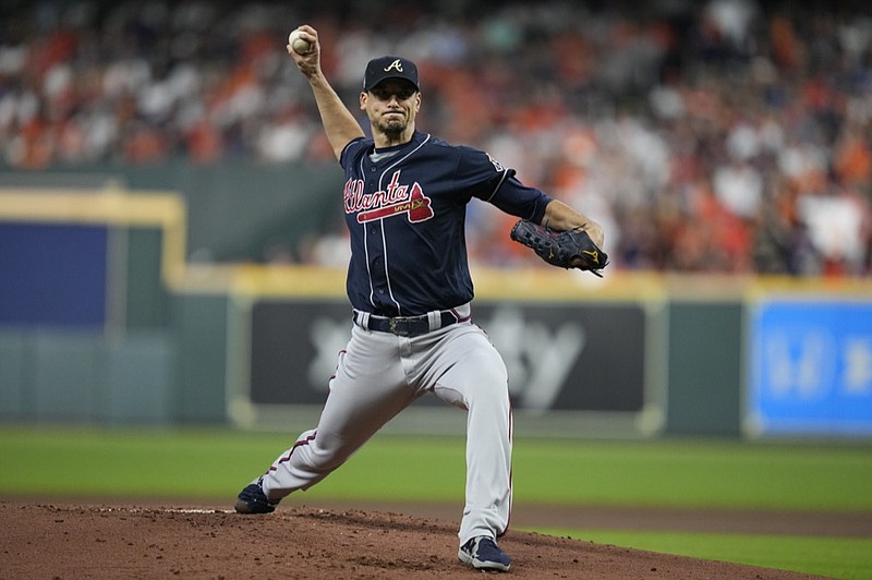 Atlanta Braves starting pitcher Charlie Morton throws during the first inning of Game 1 in baseball's World Series between the Houston Astros and the Atlanta Braves Tuesday, Oct. 26, 2021, in Houston. (AP Photo/Ashley Landis)



