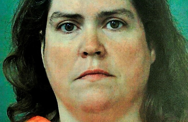 THUMBNAIL This photo provided by the Madison County, Ala., Sheriff's Department shows Rhonda Jean Carlson, who received a life sentence Wednesday, Oct. 27, 2021, for helping her husband plan the 2015 killings of his estranged pregnant wife, her unborn child and three others. Carlson, 48, avoided the death penalty in a deal with prosecutors in exchange for testifying against her husband, Christopher Henderson, prior to his trial. She admitted to helping plan the attack and was sentenced to life in prison without the possibility of parole. (Madison County Sheriff's Department/AL.com, via AP, File)