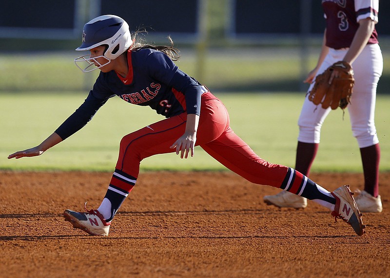 Staff file photo by C.B. Schmelter / Zoe Wright drove in a run to help Heritage win its opening game of the GHSA Class AAAA softball state tournament Thursday in Columbus.