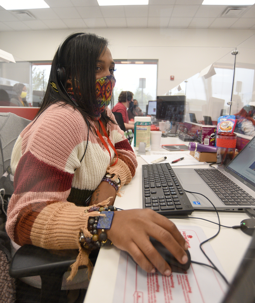 Staff Photo by Matt Hamilton / Kyria Jones goes through training at the HomeServe Chattanooga Contact Center on Friday, October 29, 2021. HomeServe hosted a hiring event as well as Halloween costume party on Friday.