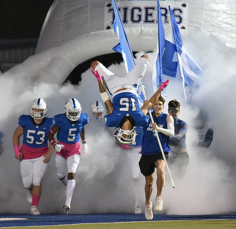 Staff photo by Matt Hamilton / Ringgold football player Drelyn Morris flips as the Tigers take the field for their Oct. 8 home game against LaFayette. The Tiger won that night and again Friday against Sonoraville to reach 9-0 overall and 7-0 in GHSA Region 6-AAA.