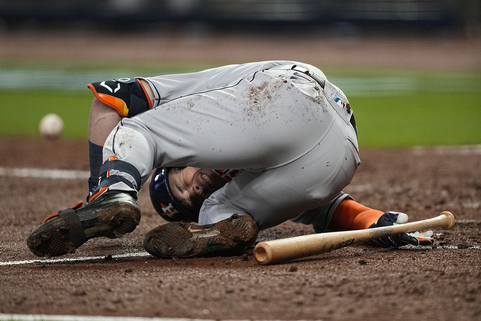 Houston Astros' Alex Bregman reacts after getting hit by a pitch during the sixth inning in Game 3 of baseball's World Series between the Houston Astros and the Atlanta Braves Friday, Oct. 29, 2021, in Atlanta. (AP Photo/David J. Phillip)