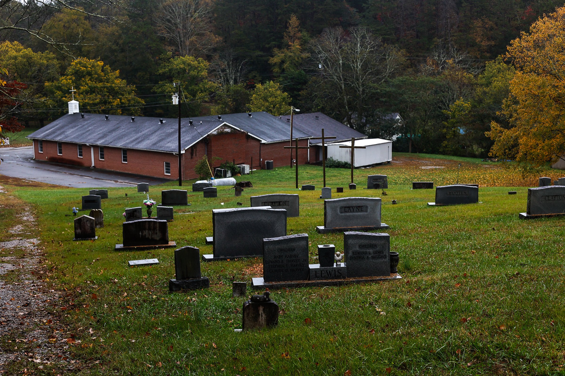 Staff photo by Troy Stolt / The cemetery behind Friendship Baptist Church is seen on Thursday, Oct. 28, 2021, in Chattanooga, Tenn. The church, which has relocated to another location off of Gadd Road, announced its intention to sell the former location and the cemetery located behind the building.