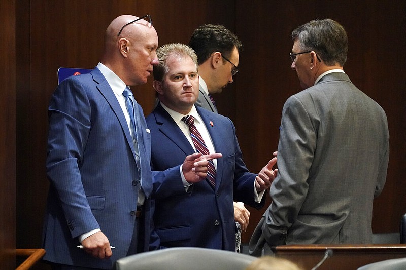 State Rep. Mark Hall, R-Cleveland, left, talks with Rep. William Lamberth, R-Portland, before a meeting of the COVID-19 Committee on Thursday, Oct. 28, 2021, in Nashville, Tenn. Tennessee's General Assembly met for a special legislative session to address COVID-19 measures. / AP photo by Mark Humphrey