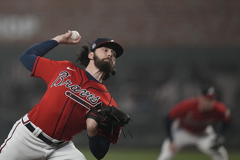 AP photo by David J. Phillip / Atlanta Braves starter Ian Anderson pitches during Game 3 of the World Series against the Houston Astros on Friday night at Truist Park.