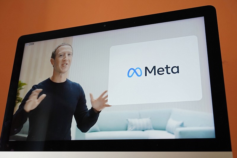 Photo by Eric Risberg of The Associated Press / Seen on the screen of a device in Sausalito, Calif., Facebook CEO Mark Zuckerberg announces their new name, Meta, during a virtual event on Thursday, Oct. 28, 2021. Zuckerberg talked up creating a virtual reality "metaverse" for business, entertainment and meaningful social interactions.
