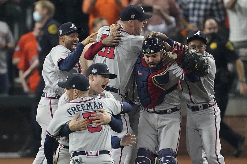 The Atlanta Braves celebrate after winning baseball's World Series in Game 6 against the Houston Astros Tuesday, Nov. 2, 2021, in Houston. The Braves won 7-0. (AP Photo/Sue Ogrocki)