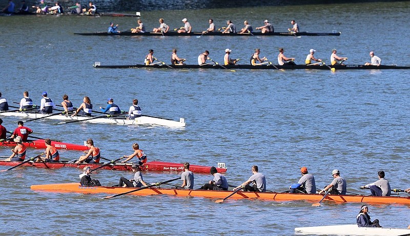 Staff file photo / Athletes get out on the Tennessee River to compete in the Head of the Hooch rowing regatta in 2019 in Chattanooga, Tennessee.