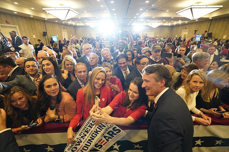 Photo by Melissa Lyttle of The New York Times / Glenn Youngkin, Republican candidate for Virginia governor, greets supporters at his election night event in Chantilly, Va., on Tuesday, Nov. 2, 2021. Youngkin defeated Democrat Terry McAuliffe in a closely contested race for Virginia governor.