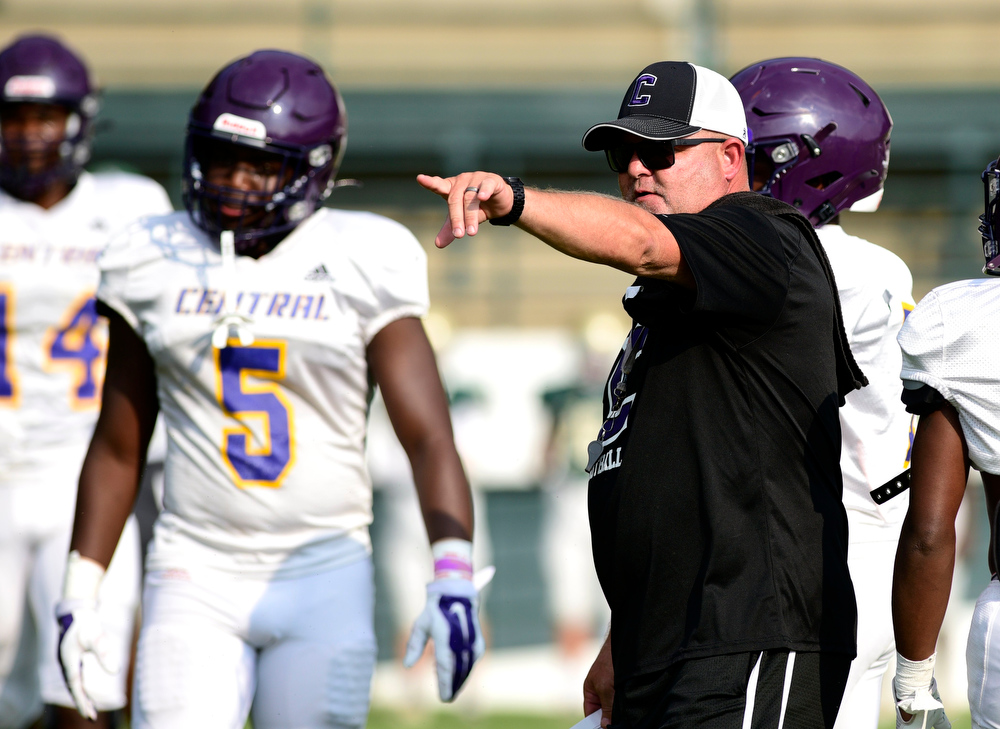 Staff photo by Robin Rudd / Central football coach Curt Jones directs the Purple Pounders during a scrimmage in early August. Central (6-2) will travel to Macon County (7-3) for the first round of the Class 4A playoffs on Friday.