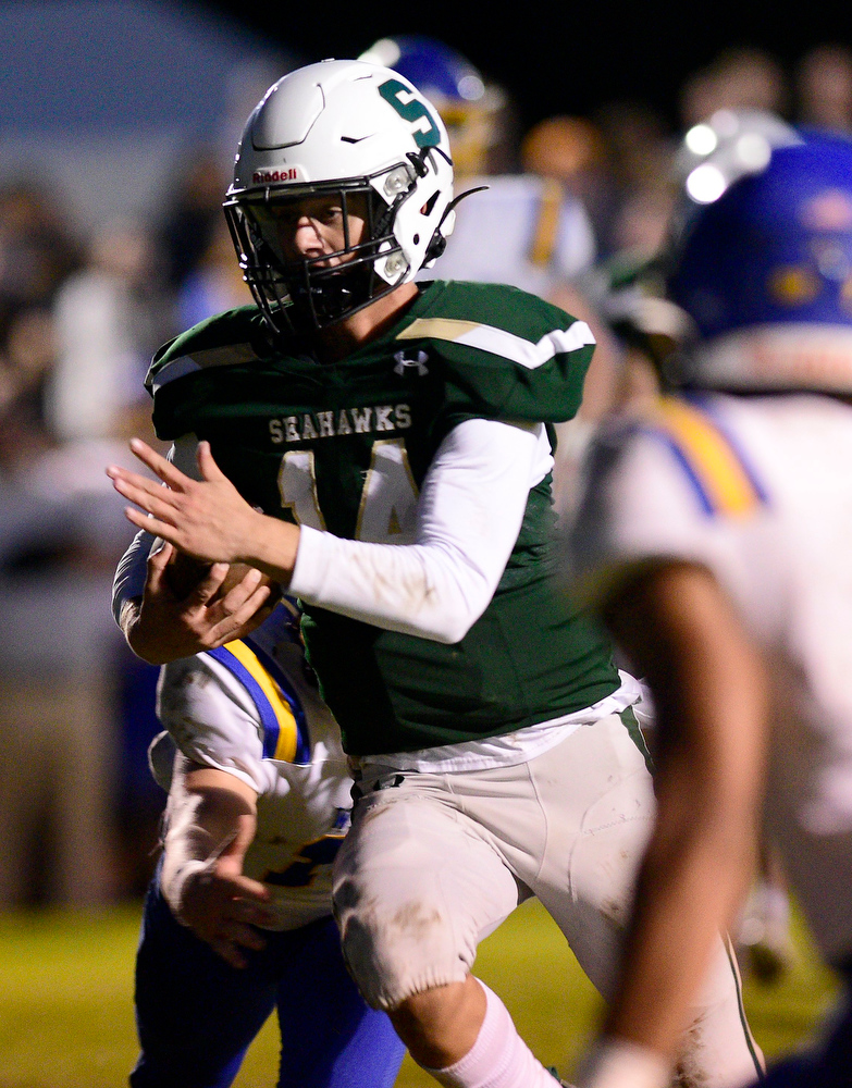 Staff file photo by Robin Rudd / Silverdale Baptist Academy quarterback Brett Rogers runs for a touchdown. The Seahawks (8-2) will face Northpoint Christian (5-5) at Nashville's Lipscomb Academy in the first round of the Division II-AA playoffs on Friday.