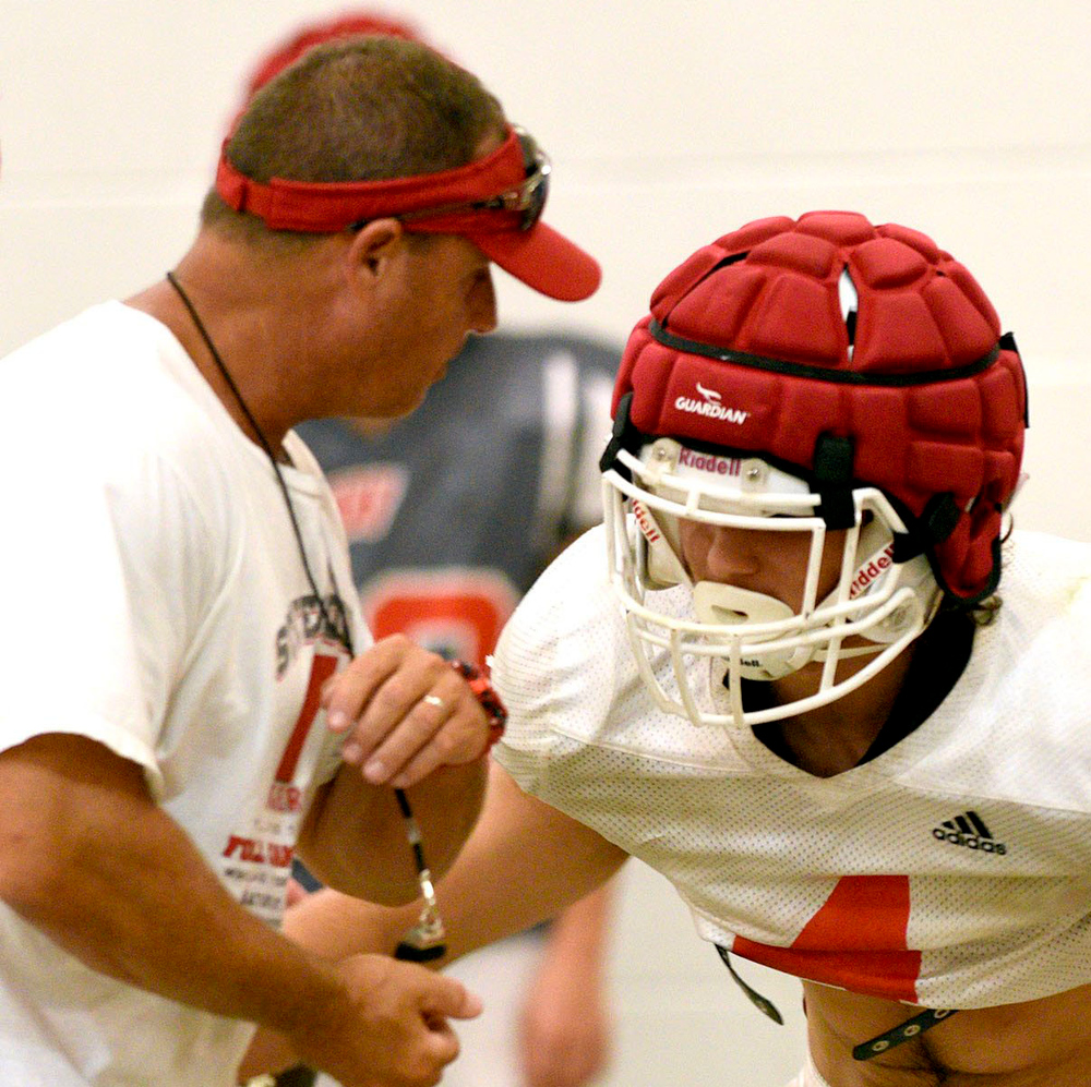 Staff file photo by Robin Rudd/ Whitwell football coach Rocky Stephenson works with a player during practice. The Tigers (4-3) will host Jo Byrns (5-5) in the first round of the Class 1A playoffs on Friday.
