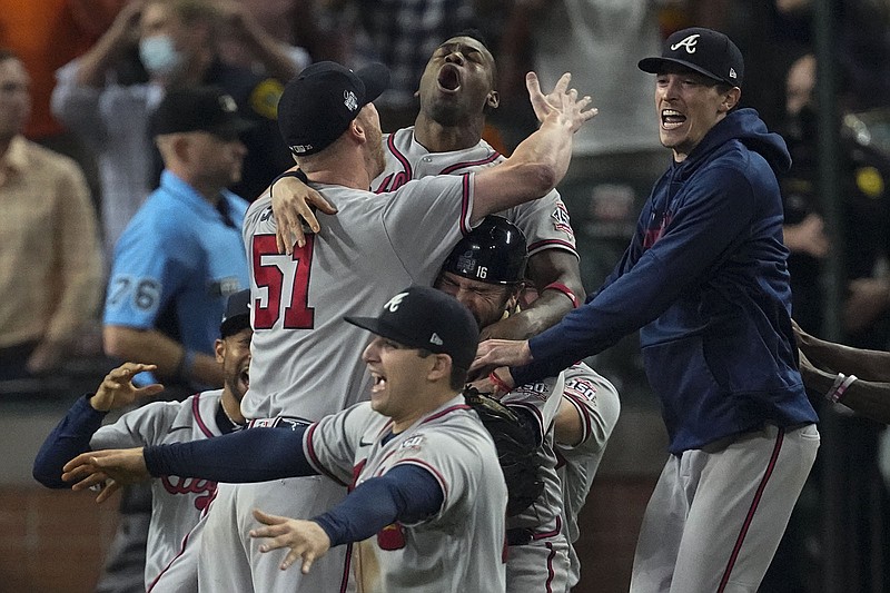 AP photo by Sue Ogrocki / The Atlanta Braves celebrate after winning the World Series on Tuesday night against the Houston Astros.