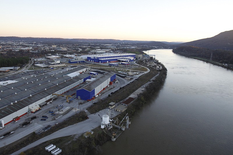 Staff file photo / A sliver of mostly undeveloped land sits along the Tennessee River and next to the former Alstom manufacturing site now called The Bend. Part of the narrow parcel shown here could hold a new downtown marina.