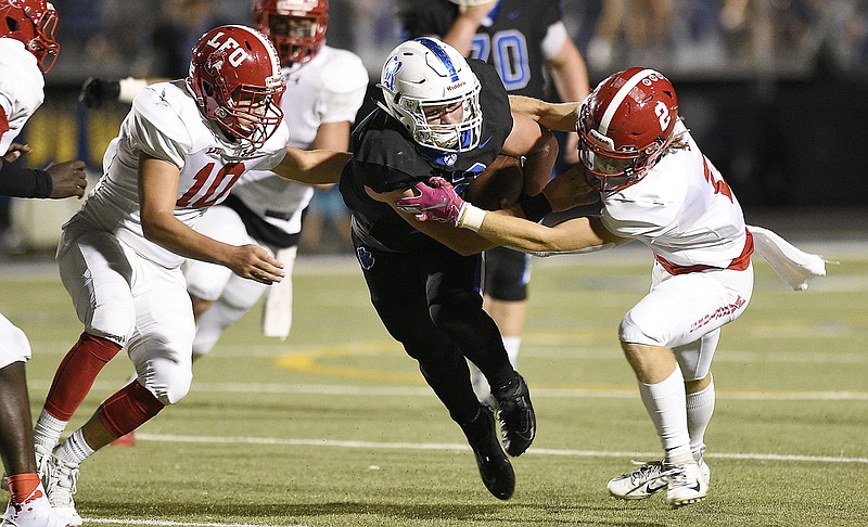 Staff photo by Robin Rudd / Ringgold senior safety Kyle White, center, shown during a 2019 game against Lakeview-Fort Oglethorpe, is at the heart of a Tigers defense tasked with trying to contain a talented Rockmart offense with the GHSA Region 6-AAA title on the line Friday night.