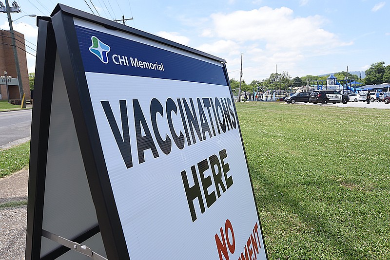 Staff Photo by Matt Hamilton / A sign advertises a block party at the BlueCross Healthy Place at Highland Park in Chattanooga on Saturday, June 26, 2021.