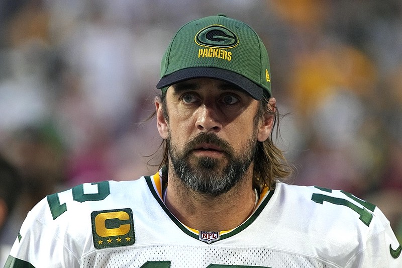 Green Bay Packers quarterback Aaron Rodgers (12) is shown during the first half of an NFL football game against the Arizona Cardinals, Thursday, Oct. 28, 2021, in Glendale, Ariz. Packers quarterback Aaron Rodgers is in the NFL's COVID-19 protocol and will miss Sunday's game at Kansas City. Green Bay coach Matt LaFleur confirmed Wednesday, Nov. 3, 2021, that Rodgers was in the protocol, but would not say if Rodgers had tested positive nor if the reigning NFL MVP has been vaccinated. (AP Photo/Rick Scuteri)