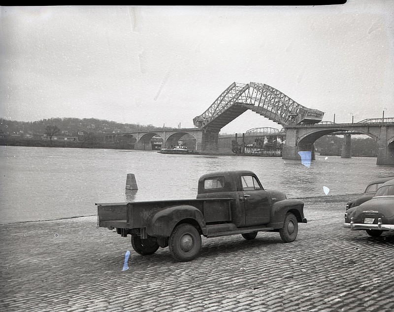 This 1953 photo shows the Market Street Bridge opening for a dredge headed to Hiwassee Island in Meigs Couty. It appeared on the front page of the Chattanooga News-Free Press on Feb. 12, 1953. Photo by Bob Sherrill courtesy of ChattanoogaHistory.com.