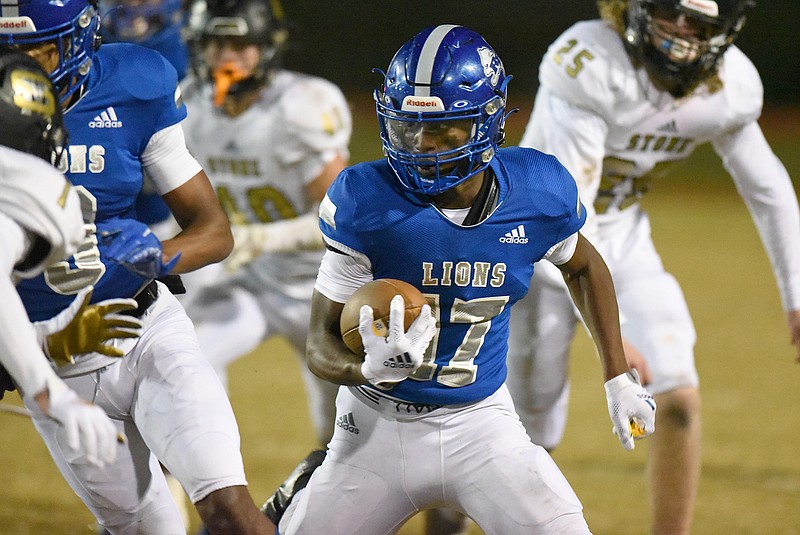 Staff photo by Matt Hamilton / Red Bank's Daune Morris carries the ball during Friday night's home game against Stone Memorial in the first round of the Class 4A playoffs.